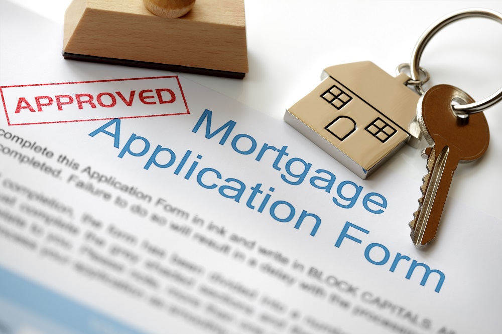 mortgage application form with house keys
